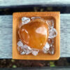 This set includes the Golden Healer Quartz Heart shown, about 135”, on a bed of Clear Quartz crystals to amplify the energy, a bamboo tray, drawstring pouch & gift box. Color variances, nicks, imperfections and cracks are the nature of genuine gemstones, crystals and minerals. Keep on your bedside table to connect w/ your subconscious while dreaming or in any room to boost manifesting. Hold in a palm during meditation or place on any Chakra to activate / balance it. Golden Healer Quartz is a high vibration crystal that can scan your entire body both physically & energetically to help you find blockages to help you clear them. It’s not an overnight process but you will notice the rewards you’ll reap. It stimulates your creativity and opens you up to new possibilities of success bringing you abundance and prosperity. Aligns & connects all of your Chakras from your earthly body to Higher Realms. May this bring you healing, creativity & success.