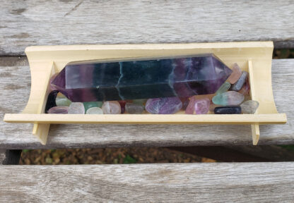 This includes the Fluorite Double Terminated Wand shown, approximately 4.05 x 0.95”, on a bed of Fluorite Chip Stones, bamboo half reed tray stand, drawstring pouch & a gift box. Color variances, nicks, imperfections and cracks are the nature of genuine gemstones, crystals and minerals.