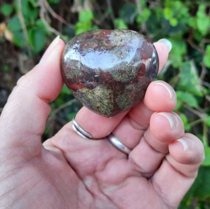 This includes the Wand about 4.2 x .7” & heart shown, about 1.7 x 1.5 x 1" . Color variances, nicks, imperfections and cracks are the nature of genuine gemstones, crystals and minerals. Dragonstone / Dragon Blood Stone / Dragon’s Blood Jasper is a combination of Epidote & Red Piemontite which is a form of Epidote. Epidote is an attraction stone increasing whatever it touches and magnifies what you create. Dragonstone is a stone of courage, strength, creativity & personal power. It aids in problem solving, helps you to better learn from past mistakes & helps you to remember the beauty of life to get you through feelings of self pity. It promotes happiness, optimism & inner knowing. Dragonstone activates the Root & Heart Chakras. The double terminated points allow you to send & receive energy. Hold in your left or non-dominant hand to receive energies or your right or dominant hand to send energies. The heart shape represents divine love, emanating kindness, care & understanding.